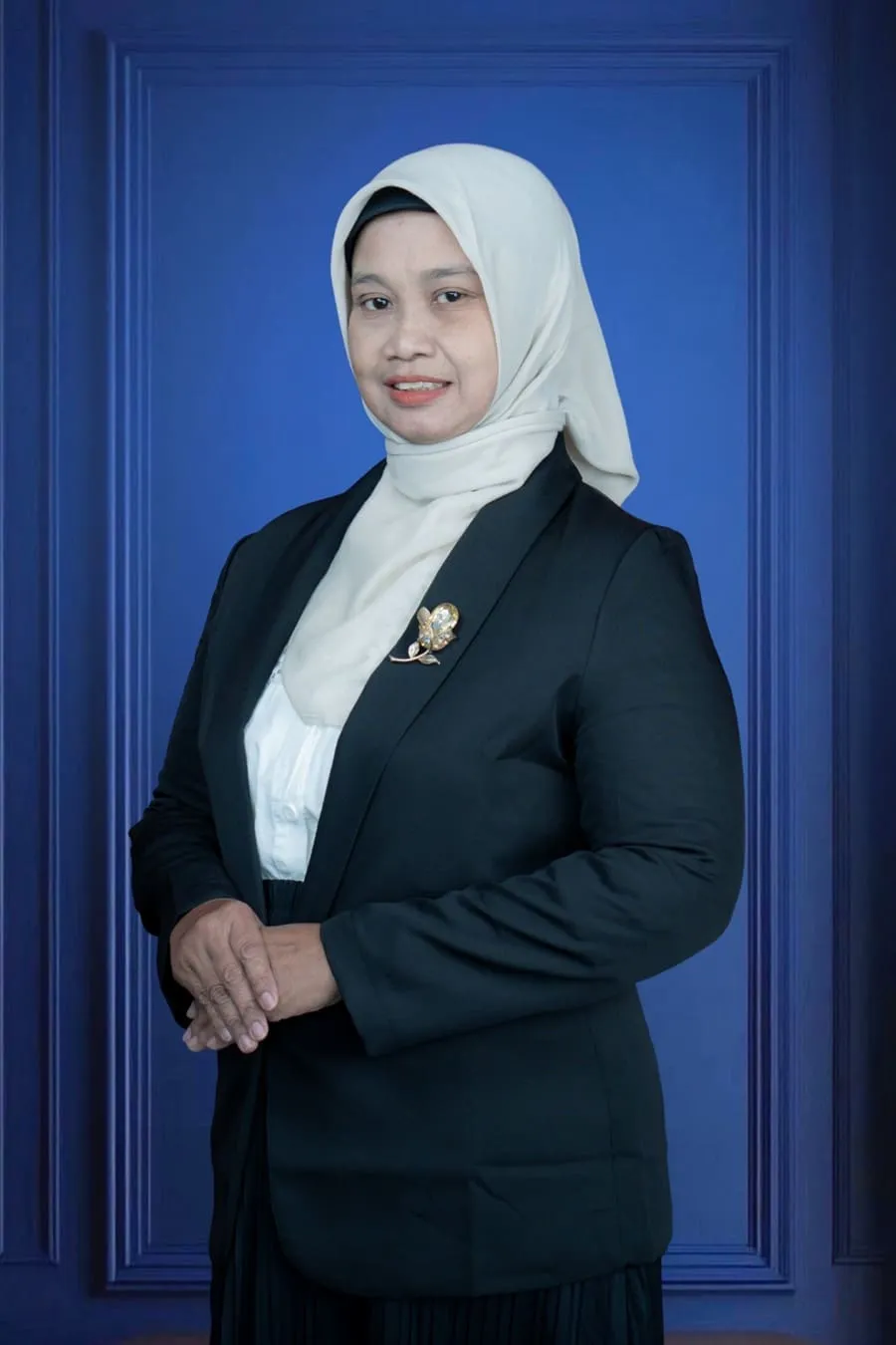Portrait of Dewi Elliana, SKM, S.Tr.Keb, M.Kes